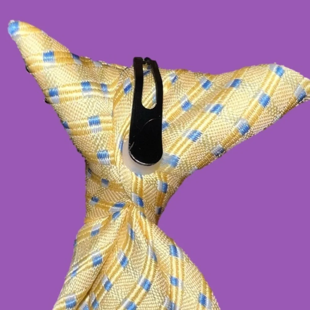 Little boy’s light yellow and baby blue tie great for Spring